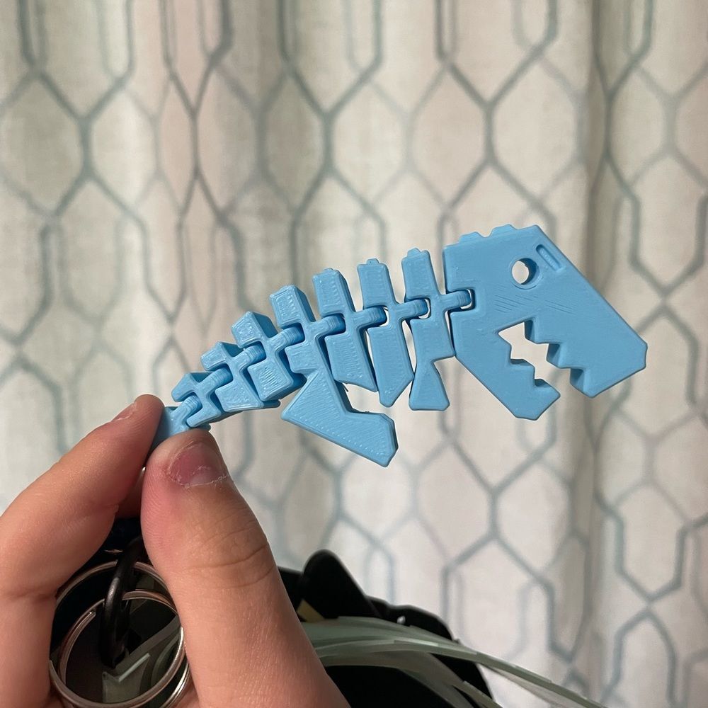 Dancing T-Rex key chain 3D printed